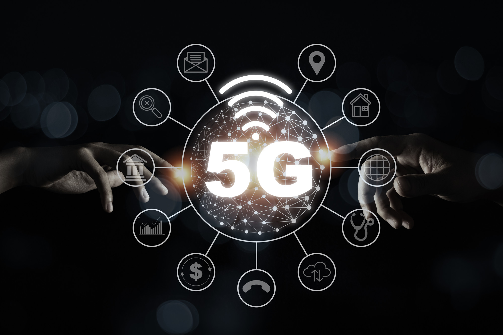 Two Hand touching to 5G wireless network telecommunication and mobile internet signal. Internet of thing IOT high speed and change the world. Technology business concept.
